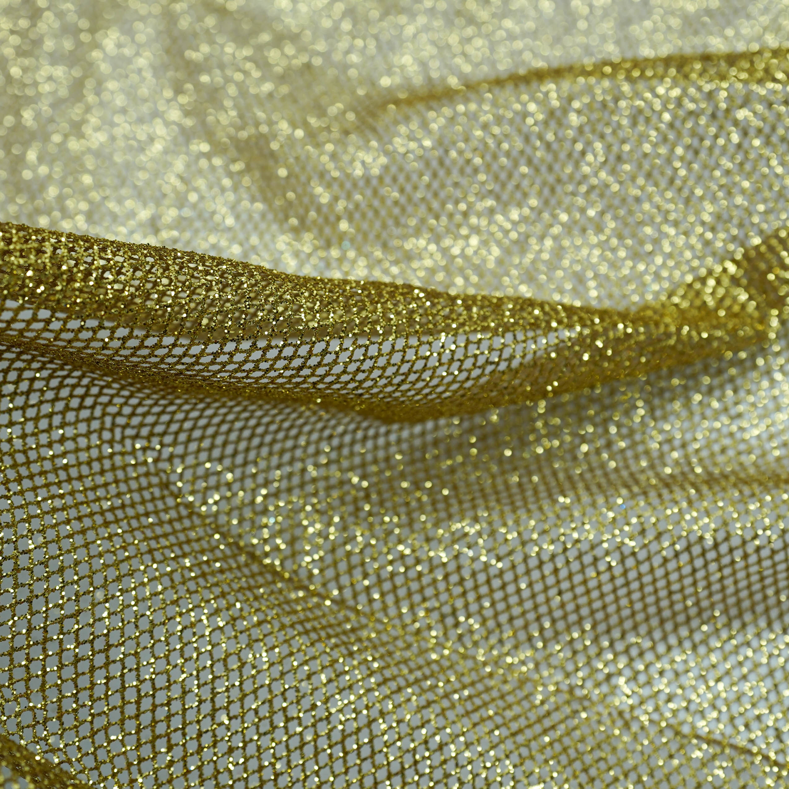 Tecido tela com glitter dourado