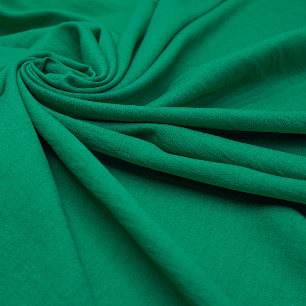 Tecido crepe leve com textura de linho verde
