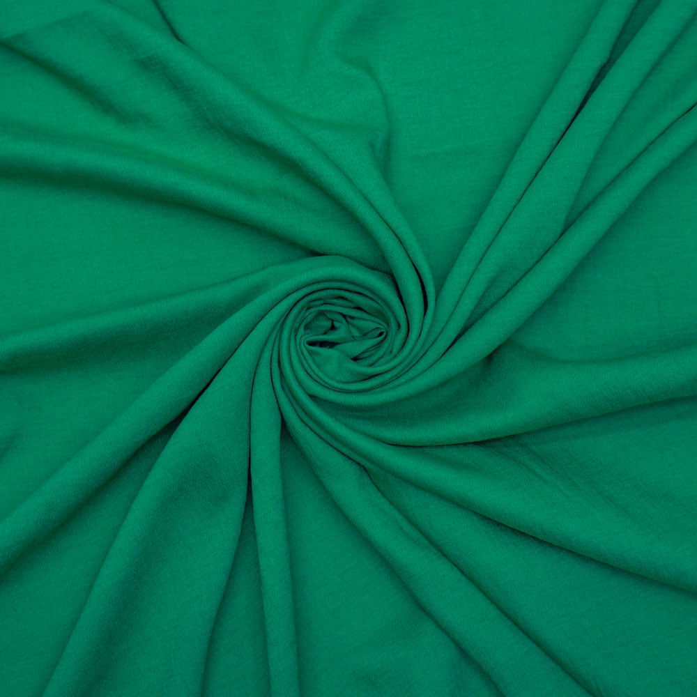 Tecido crepe leve com textura de linho verde