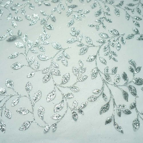 Tecido Tule com glitter folhagens prata